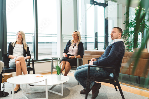 Business people having a meeting in office lounge