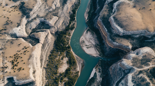 Rio grande river carving through canyon from aerial viewpoint