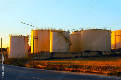 Obraz na płótnie Oil storage tanks at refinery plant. Stainless tanks at chemical industrial factory w salonie