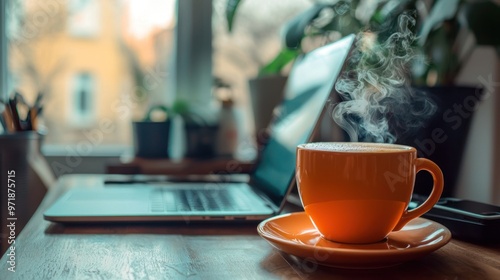 Stylish workspace with a laptop, a steaming coffee cup, and essential office tools.