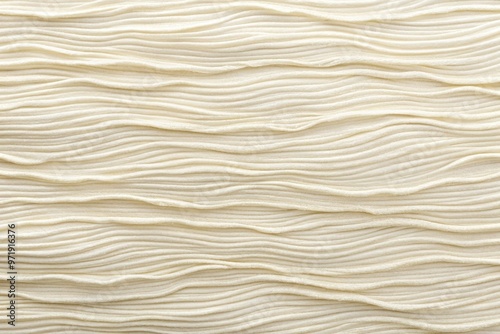 Soft, creamy white textured background featuring subtle, organic ridges and imperfections, evoking a sense of tactile elegance and sophistication in a minimalist aesthetic.