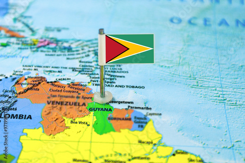 Konstfotografi Guyana flag on the map with selective focus and shallow DOF