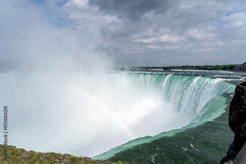 Fototapeta premium rainbow over falls