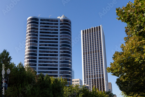 Modern architecture tall skyscraper building exterior design with nice patterns, windows, and details. Located in Downtown Portland, Oregon. High quality picture for download