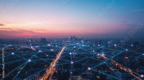 An aerial view of a city skyline at dusk with a glowing network of lines connecting buildings, representing connectivity and technology.