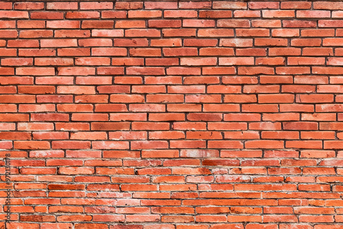 Red brick wall with a slightly aged, textured appearance.