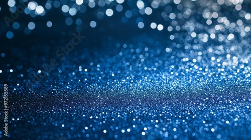 deep blue background with scattered silver glitter