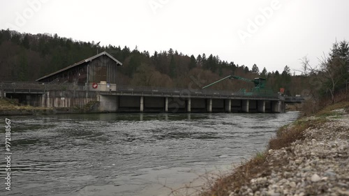 Fish ladder at Baierbrunn hydroelectric power plant. Fish ladder and dam on Isar River near Munich, Germany. Vogelschutzgebietes. Grunwald. Isar weir in southern Bavaria with fish stairs.  photo