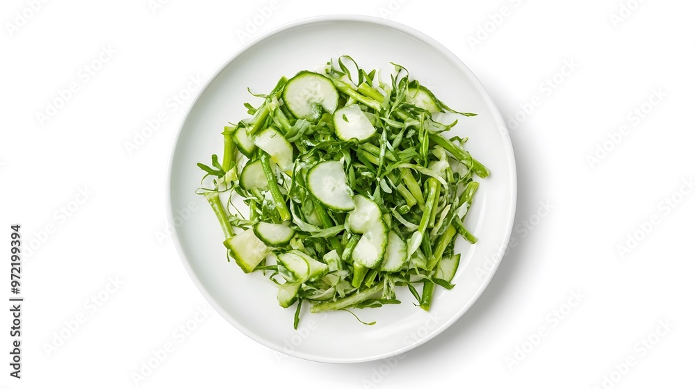 Fresh green salad with cucumber and arugula on white background Fresh green salad with cucumber and arugula on white background