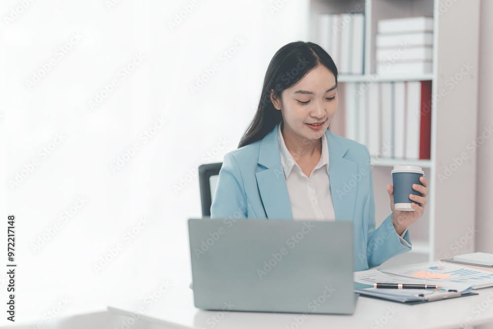 Financial professionals and analysts work with documents and calculators to calculate financial reports in their home offices. Financial professionals and analysts work with documents and calculators to calculate financial reports in their home offices.