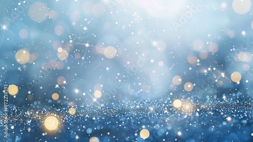 Festive blue glitter bokeh background with blurred sparkling lights for holiday celebrations and designs