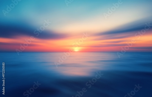 Motion blurred background of sunset on the sea