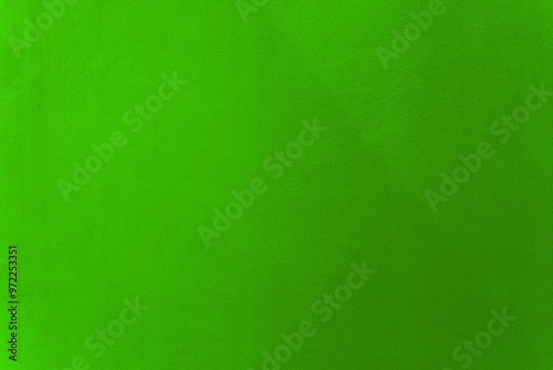 Light green paint on cement wall texture as background.