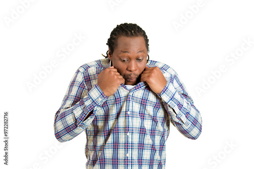 Φωτογραφία young funny looking man opening shirt to vent, blow air, it's hot, unpleasant aw