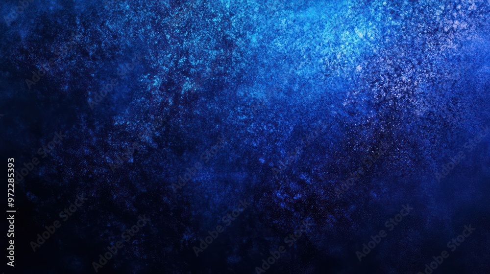 Fototapeta premium A mesmerizing abstract background featuring deep blue hues with a textured, ethereal quality.