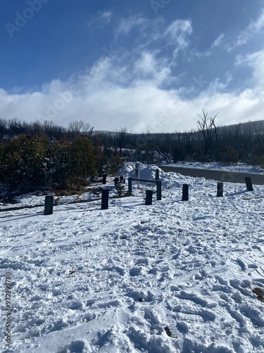 landscape with snow covered bridge photo