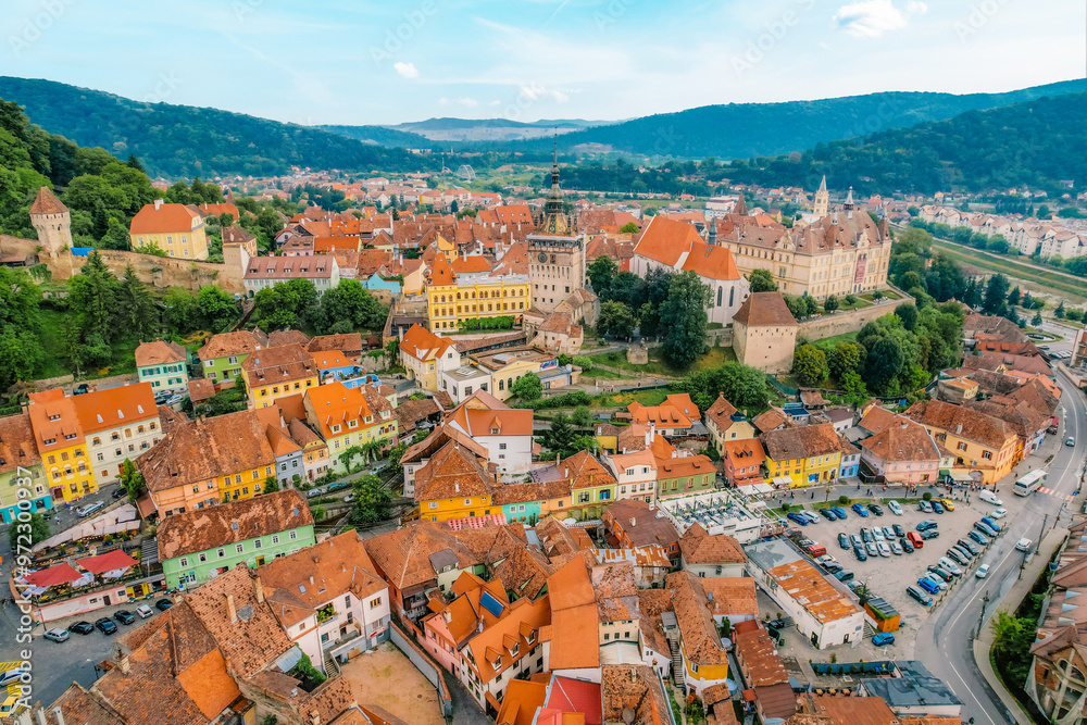 Fototapeta premium Medieval fortress and fortified citadel of Sighisoara with colorful houses in transylvania.