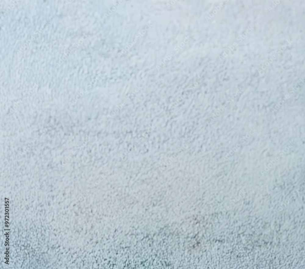 A close-up view of textured blue stucco wall showcasing subtle patterns and colors for artistic or architectural use. Isolate on clean background A close-up view of textured blue stucco wall showcasing subtle patterns and colors for artistic or architectural use. Isolate on clean background