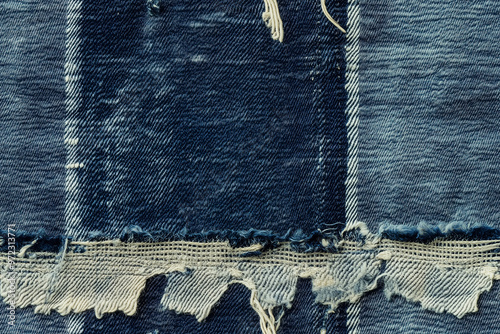 Worn denim fabric texture, faded blue, frayed edges, detailed stitching, casual and rugged style