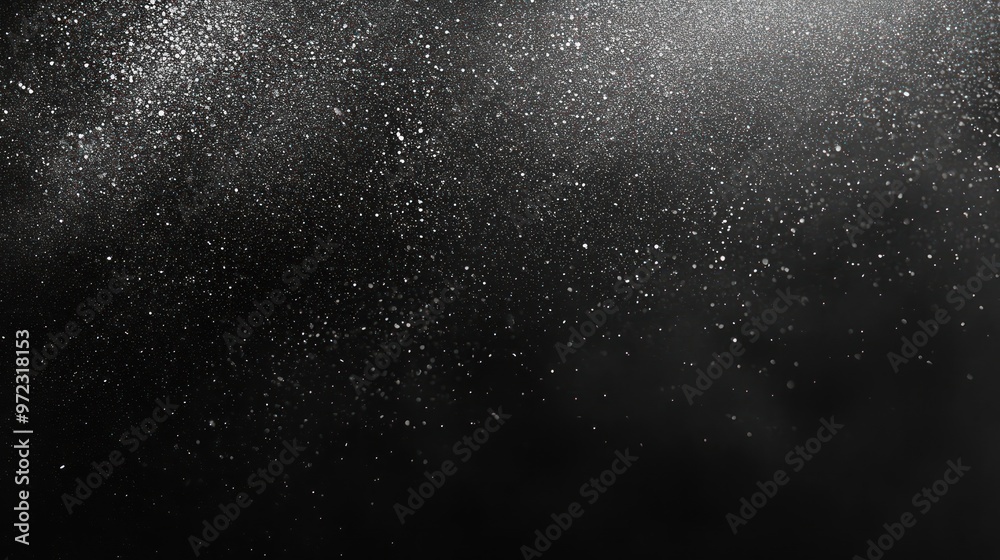A mesmerizing display of sparkling dust particles against a dark backdrop. A mesmerizing display of sparkling dust particles against a dark backdrop.