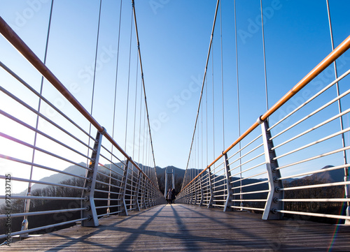 Yeongbuk-myeon, Pocheon-si, Gyeonggi-do, South Korea - November 28, 2020: Tourists are crossing Hantan River Sky Bridge in autumn
 photo