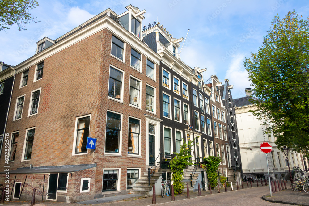 Naklejka premium Typical Corner Building in Amsterdam