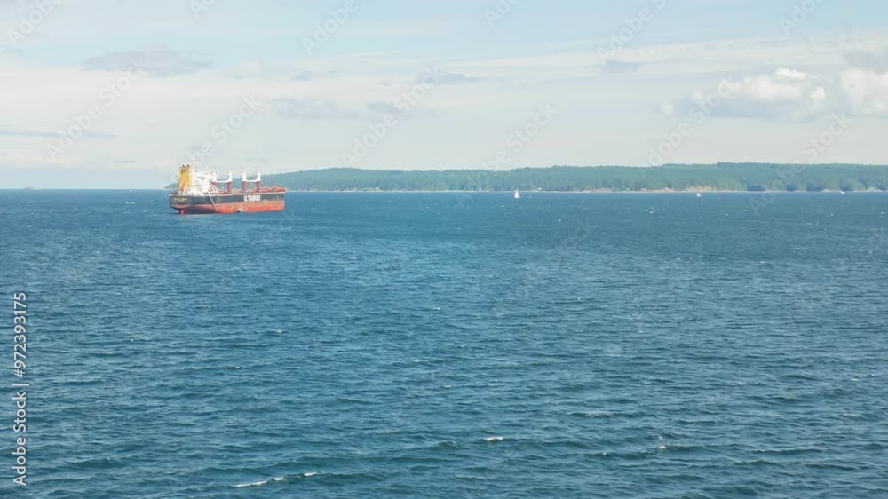 Tranquil beauty of a ship gliding through calm waters Tranquil beauty of a ship gliding through calm waters