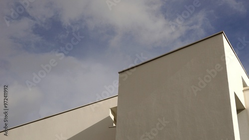 facade of contemporary minimalist construction against the sky