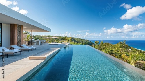 Luxurious villa with contemporary design, positioned on a hillside with expansive ocean