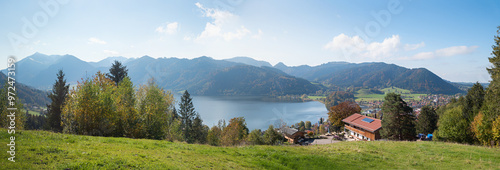 idyllic landscape above lake Schliersee with alpine restaurant and alps view photo