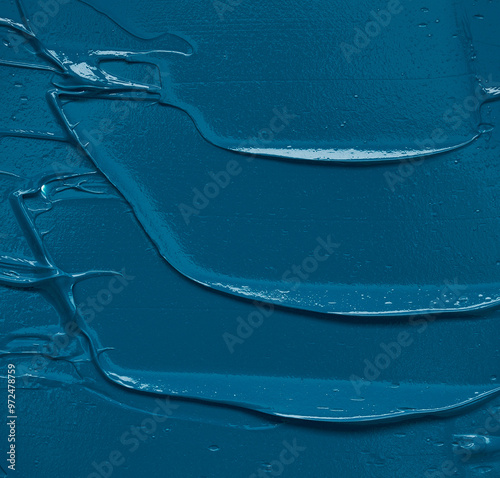 A smear of acrylic paint on a white background, a unique work of art, an expressive element of decor. The photograph reflects a combination of color and space that captures attention and inspires.