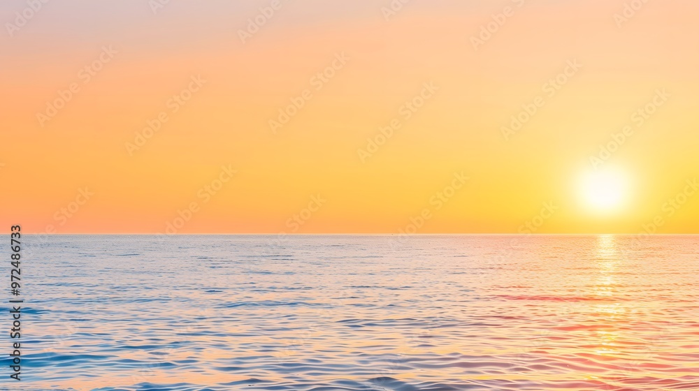 Dramatic golden hues paint the sky as the sun dips below the horizon, casting long shadows across the shimmering ocean Dramatic golden hues paint the sky as the sun dips below the horizon, casting long shadows across the shimmering ocean