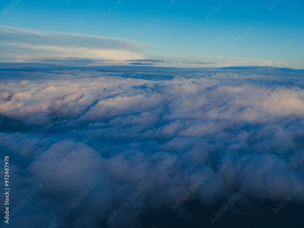 view on clouds from airplane window view on clouds from airplane window