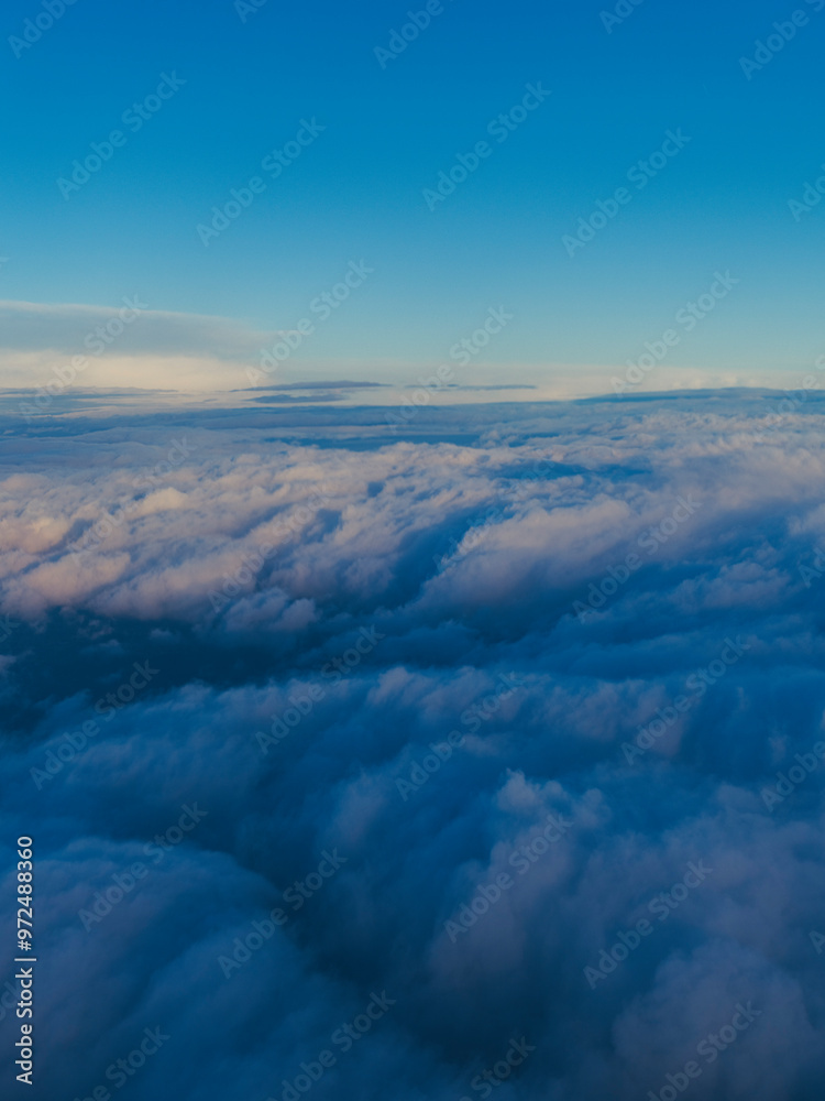 view on clouds from airplane window