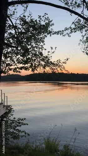 Quiet relaxing sunset by a lovely calm lake near Lerum, Sweden