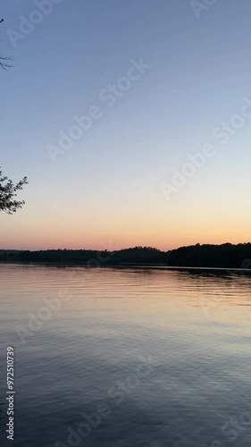 Quiet relaxing sunset by a lovely calm lake near Lerum, Sweden photo