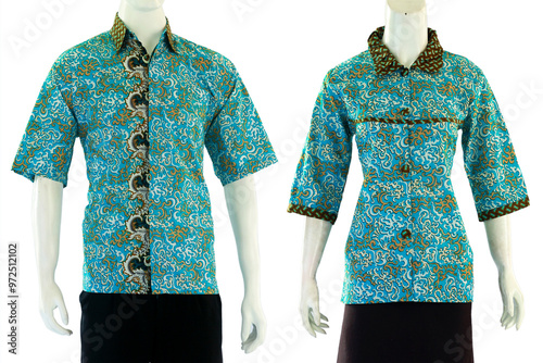 Couple batik outfit in turquoise green with a blouse cut for women and short sleeve shirts for men.