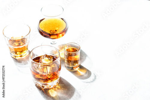 Strong alcohol drink. Cognac, whisky, rum, tequila at white background.