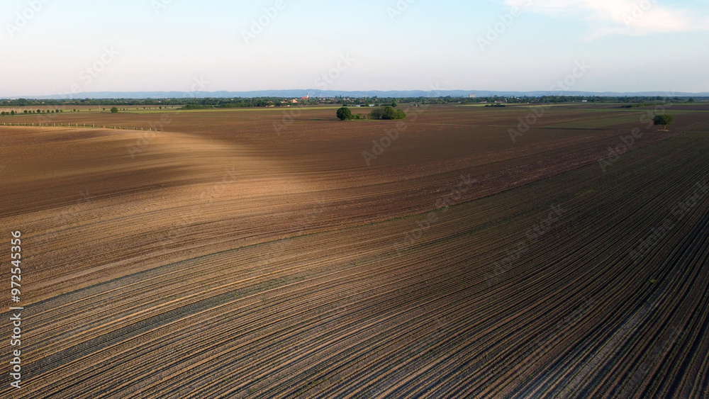 Obraz premium plowed field in spring in Vojvodina, drone photography