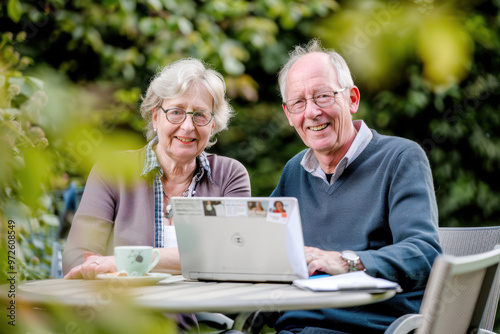 A couple of 60-year-olds sitting in front of a laptop. AI generative.