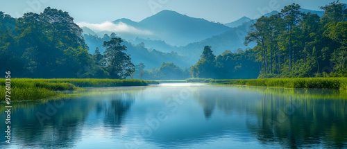  Khao Yai National Park, lush forest and waterfalls cascading down from the cliffs. The sound of the waterfall echoes in the forest, among the tall trees.