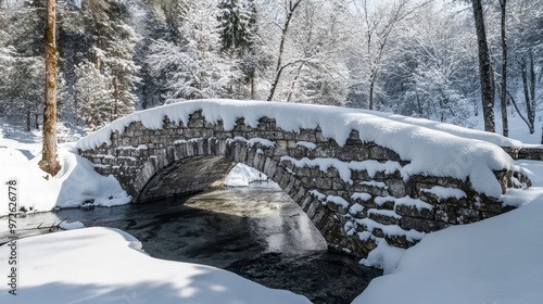 Fresh Snow Blanketing an Ancient Stone Bridge photo