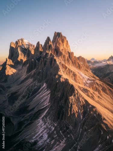 Sunrise hitting the rugged, towering mountain peaks