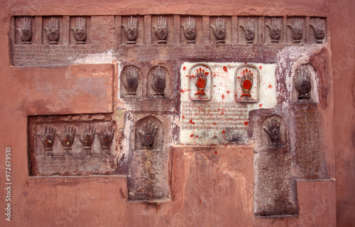 Women Queens Handprints of Sati and grid of Sculpted hands at the Meherangarh in the Town of Jodhpur in the Province of Rajasthan in India. India, Jodhpur, January, 1998