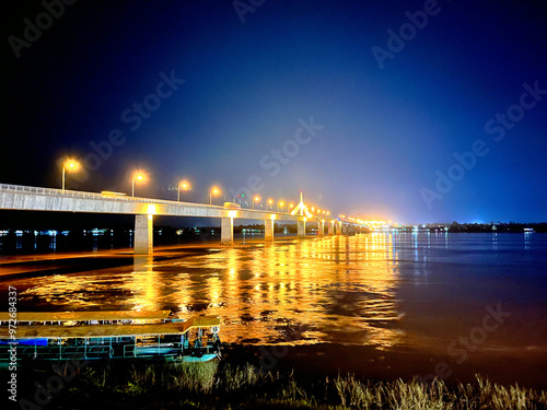 Bridge at The Mekong River Between Thailand and Laos, Bridge over kong river at night, Second Thai–Lao Friendship Bridge. over the Mekong connects Mukdahan Province in Thailand photo