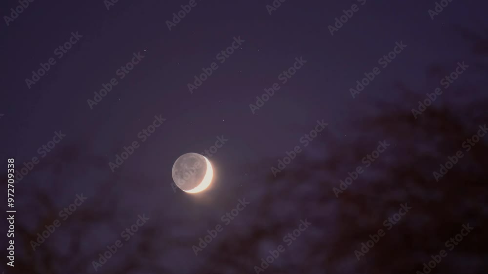 The rising moon in the night sky. 4k video with the earth's natural satellite The rising moon in the night sky. 4k video with the earth's natural satellite