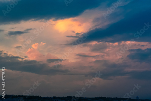 Avalon, New Jersey, USA - The view from the ocean looking at the homes on the coastline with dramatic clouds above them in this beach town on the southern New Jersey photo