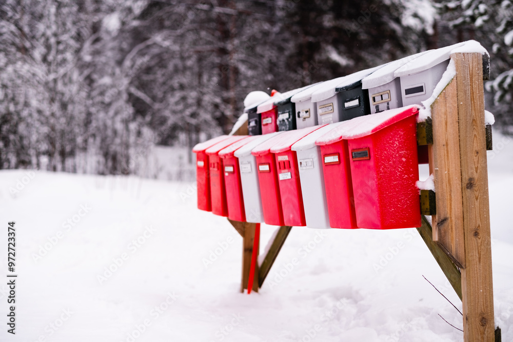 Naklejka premium Row of Mailboxes in the Snow