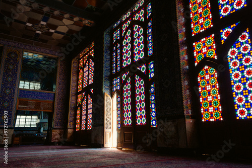 Wallpaper Mural Interior of a mosque in Yazd, Iran with stained glass doors and windows and red Persian carpets. Torontodigital.ca