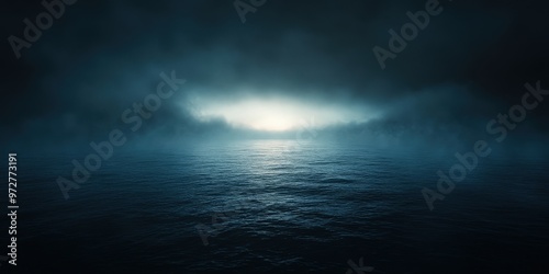 Dark ocean mist covering still water with moody atmospheric fog, creating a mysterious and surreal blue horizon in the distance, evoking feelings of solitude and tranquility 